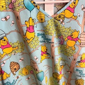 Winnie the Pooh “Bee at one with nature” Scrub top